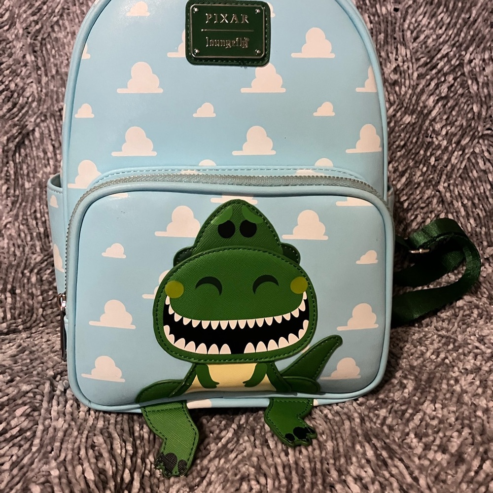 Pixar Loungefly Toy Story Dinosaur Backpack - Light Blue and Green